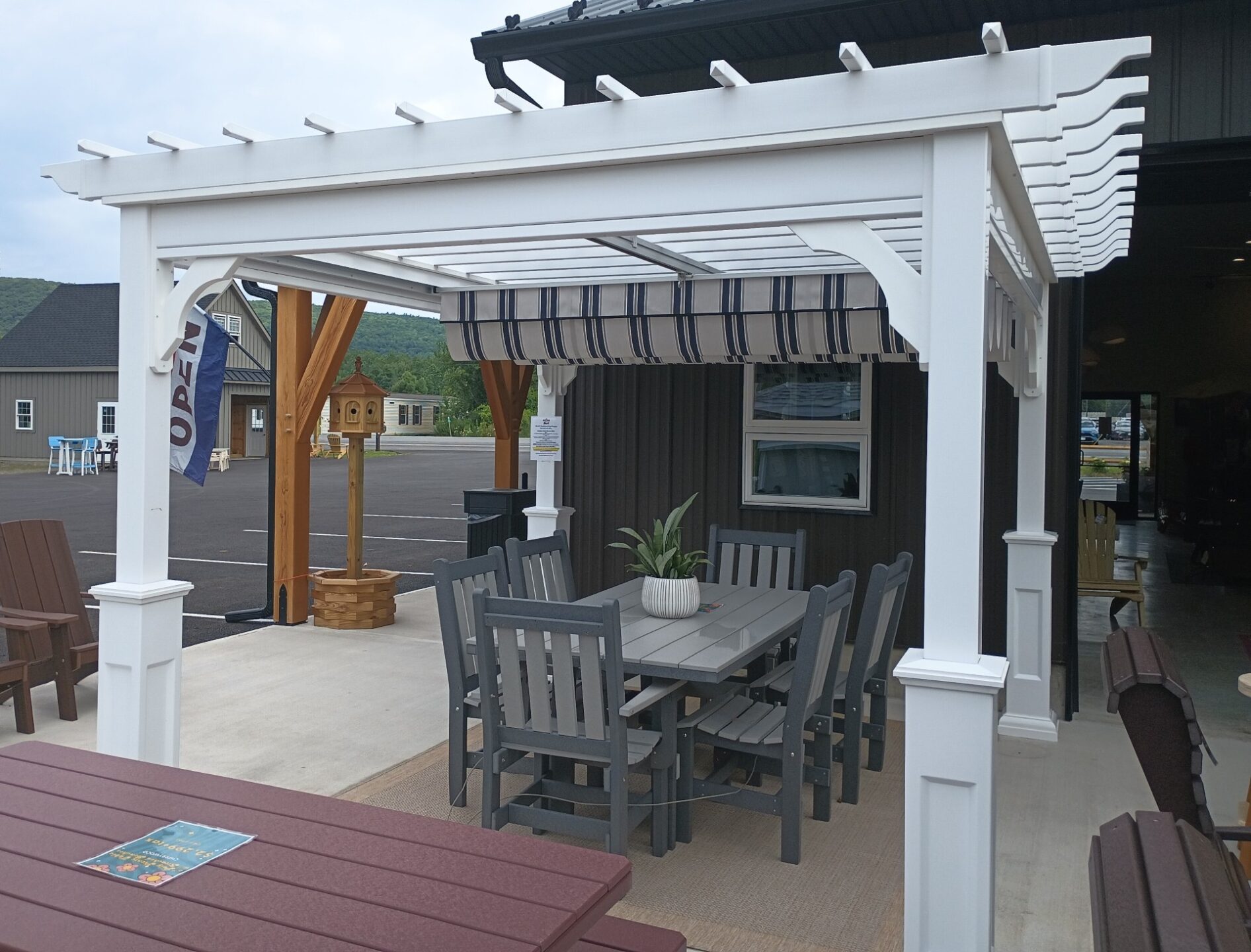 White vinyl pergola with ez shade